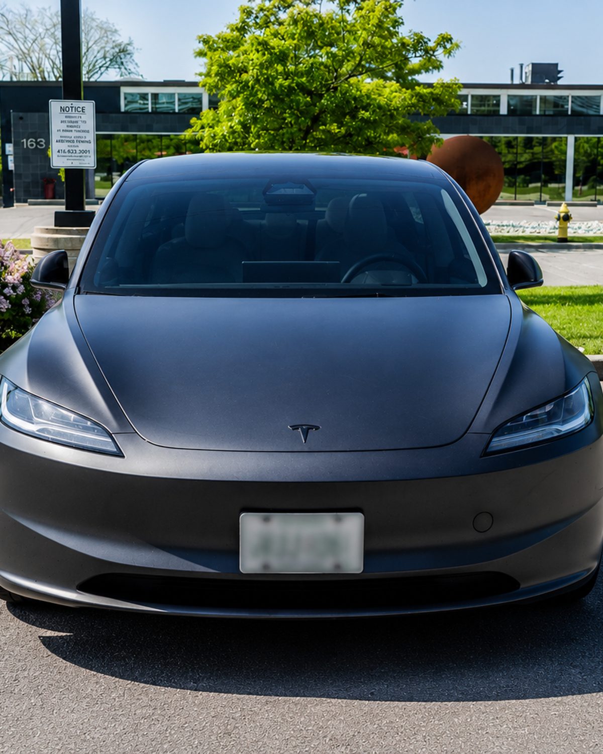 Grey 2024 Tesla Model 3 electric saloon